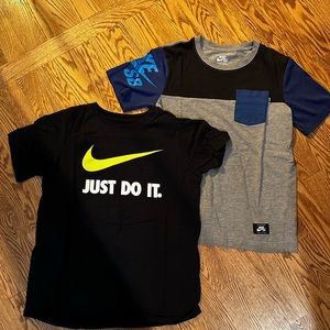 Nike tees. 2 shirts. One medium and one large